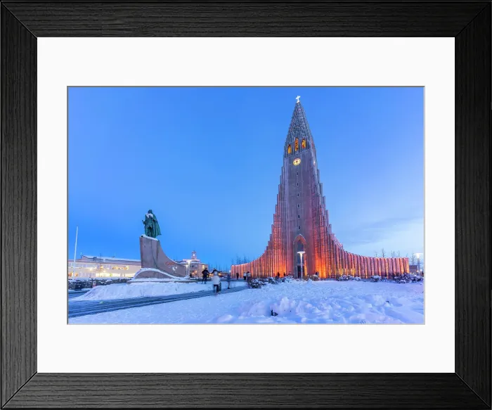 Framed Print : View of Skolavorduholt statue and Hallgrimskirkja church at dusk in winter, Reykjavik, Iceland Framed Print : View of Skolavorduholt statue and Hallgrimskirkja church at dusk in winter, Reykjavik, Iceland