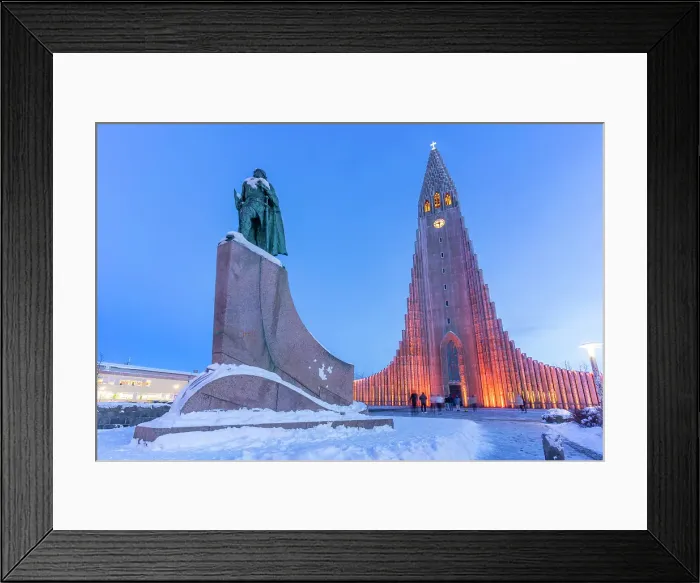 Framed Print : View of Skolavorduholt statue and Hallgrimskirkja church at dusk in winter, Reykjavik, Iceland Framed Print : View of Skolavorduholt statue and Hallgrimskirkja church at dusk in winter, Reykjavik, Iceland