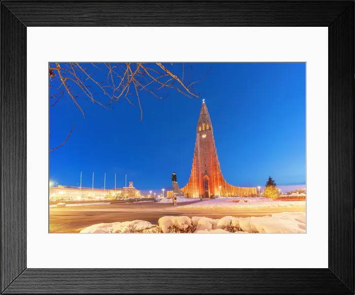 Framed Print : View of Hallgrimskirkja church illuminated at dusk in winter, Reykjavik, Iceland Framed Print : View of Hallgrimskirkja church illuminated at dusk in winter, Reykjavik, Iceland