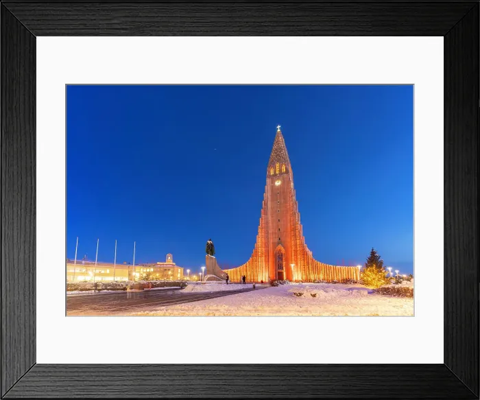 Framed Print : View of Hallgrimskirkja church illuminated at dusk in winter, Reykjavik, Iceland Framed Print : View of Hallgrimskirkja church illuminated at dusk in winter, Reykjavik, Iceland