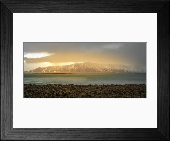Framed Print : View of mountainous coastline North of the city seen from Reykjavik in winter, Reykjavik, Iceland Framed Print : View of mountainous coastline North of the city seen from Reykjavik in winter, Reykjavik, Iceland