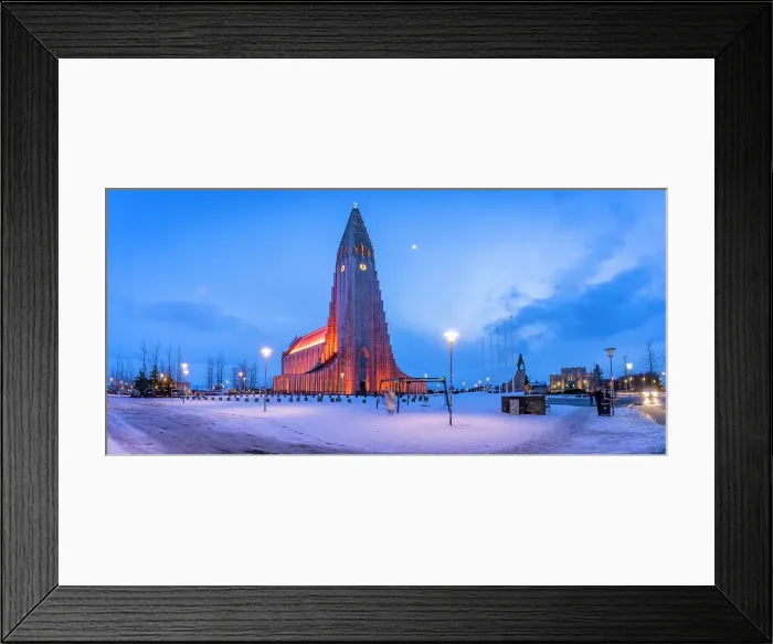 Framed Print : View of Hallgrimskirkja church illuminated at dusk in winter, Reykjavik, Iceland Framed Print : View of Hallgrimskirkja church illuminated at dusk in winter, Reykjavik, Iceland