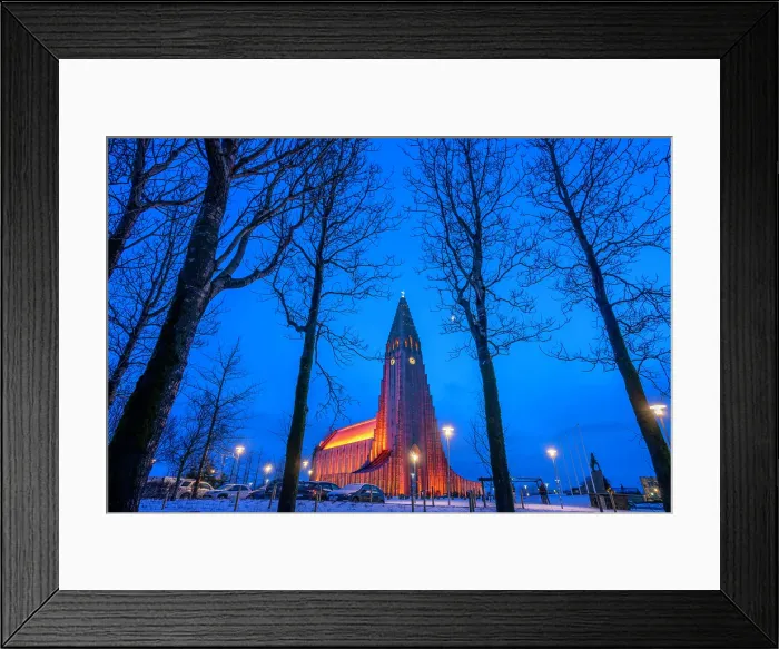 Framed Print : View of Hallgrimskirkja church illuminated at dusk in winter, Reykjavik, Iceland Framed Print : View of Hallgrimskirkja church illuminated at dusk in winter, Reykjavik, Iceland