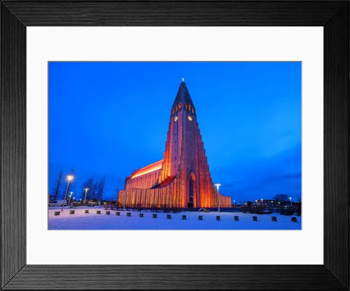 Framed Print : View of Hallgrimskirkja church illuminated at dusk in winter, Reykjavik, Iceland Framed Print : View of Hallgrimskirkja church illuminated at dusk in winter, Reykjavik, Iceland