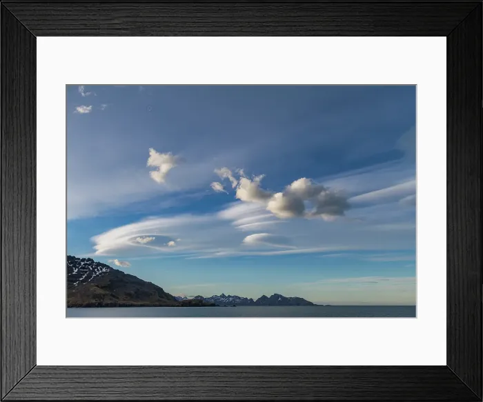 Framed Print : Interesting lenticular cloud formations forming over the island of South Georgia in the Southern Ocean Framed Print : Interesting lenticular cloud formations forming over the island of South Georgia in the Southern Ocean