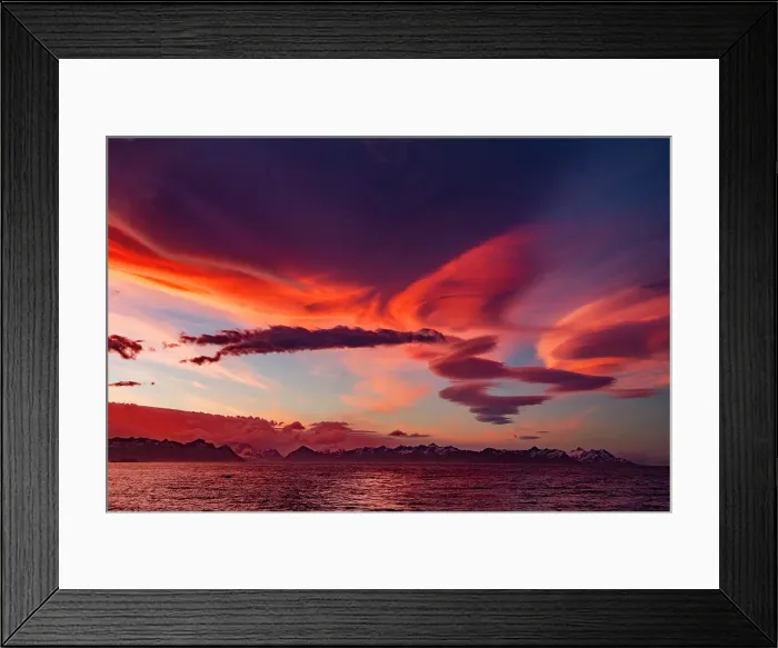 Framed Print : Interesting lenticular cloud formations forming over the island of South Georgia at sunset in the Southern Ocean