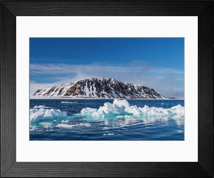 Framed Print : A view of ice-covered Phippsoya, the largest of the Sjuoyane Islands in the Svalbard Archipelago, Norway Framed Print : A view of ice-covered Phippsoya, the largest of the Sjuoyane Islands in the Svalbard Archipelago, Norway