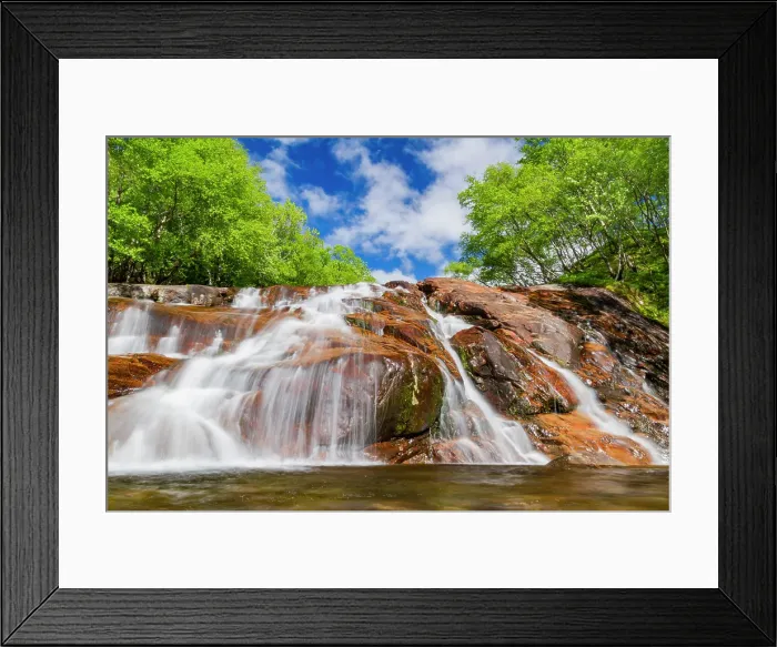 Framed Print : A beautiful waterfall just outside the small Norwegian summer area in Sandvika Bay on the south side of Svesfjord, Norway Framed Print : A beautiful waterfall just outside the small Norwegian summer area in Sandvika Bay on the south side of Svesfjord, Norway
