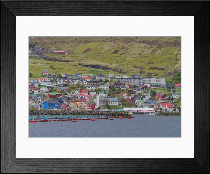 Framed Print : View of the fishing town of Westmanna on the west side of Streymoy Island in the Faroe Islands, Denmark Framed Print : View of the fishing town of Westmanna on the west side of Streymoy Island in the Faroe Islands, Denmark