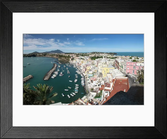 Framed Print : Panoramic view of town, colourful houses and sea, Corricella, Procida island, Phlegraean Islands, Bay of Naples, Campania, Italy Framed Print : Panoramic view of town, colourful houses and sea, Corricella, Procida island, Phlegraean Islands, Bay of Naples, Campania, Italy