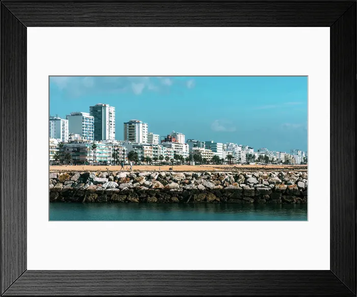 Framed Print : View of beach and promenade at Quarteira, Algarve, Portugal Framed Print : View of beach and promenade at Quarteira, Algarve, Portugal