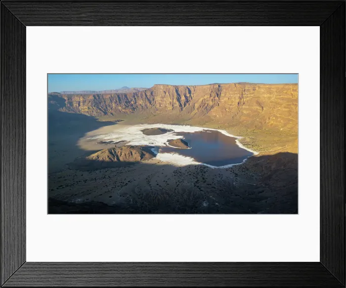 Framed Print : Aerial of the Trou du Natron volcanic crater and its natron lakes, Tibesti Mountains, Chad Framed Print : Aerial of the Trou du Natron volcanic crater and its natron lakes, Tibesti Mountains, Chad