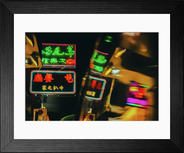 Framed Print : A reflection of Neon Signs at night in Mong Kok in Kowloon, Hong Kong, China Framed Print : A reflection of Neon Signs at night in Mong Kok in Kowloon, Hong Kong, China