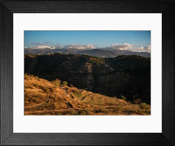 Framed Print : Sunset over the hills behind Granada and wide landscapes with the snowy Sierra Nevada behind, Granada, Andalusia, Spain