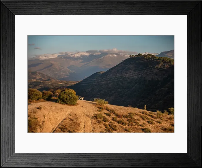 Framed Print : Sunset over the hills behind Granada and wide landscapes with the snowy Sierra Nevada behind, Granada, Andalusia, Spain Framed Print : Sunset over the hills behind Granada and wide landscapes with the snowy Sierra Nevada behind, Granada, Andalusia, Spain