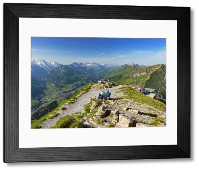 Framed Print : Couple at peak of Niesen mountain, Canton of Bern, Switzerland