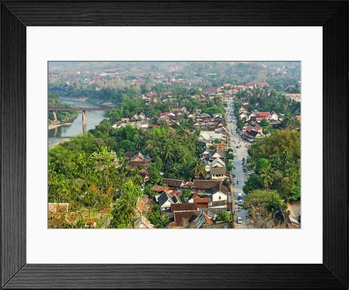 Framed Print : Vieiw over Luang Prabang to the Southeast from Phu Si hill with the Nam Khan River and the Old Bridge in the background, Luang Prabang, Laos Framed Print : Vieiw over Luang Prabang to the Southeast from Phu Si hill with the Nam Khan River and the Old Bridge in the background, Luang Prabang, Laos
