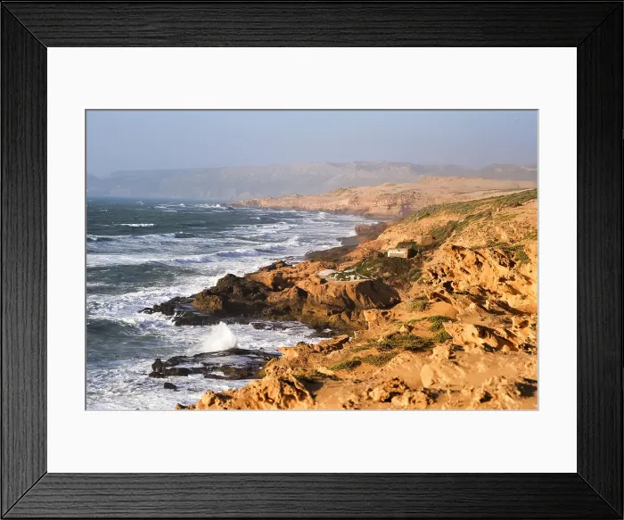 Framed Print : Fishermen's huts perched upon cliffs around Tamri on Atlantic Coast, between Agadir and Essaouira, Morocco Framed Print : Fishermen's huts perched upon cliffs around Tamri on Atlantic Coast, between Agadir and Essaouira, Morocco
