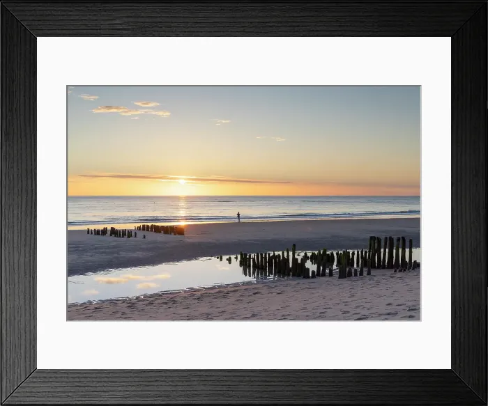 Framed Print : Woman standing next to wooden groynes on Rantum beach at sunset, Sylt, Schleswig Holstein, Germany, Europe Framed Print : Woman standing next to wooden groynes on Rantum beach at sunset, Sylt, Schleswig Holstein, Germany, Europe