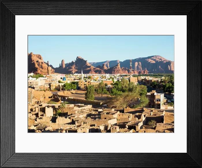 Framed Print : Old mudbrick village under reconstruction with new neighborhoods in the background, in the Old town of AlUla, Medina Province, Saudi Arabia Framed Print : Old mudbrick village under reconstruction with new neighborhoods in the background, in the Old town of AlUla, Medina Province, Saudi Arabia