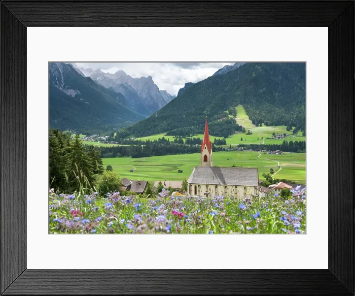 Framed Print : Wild flowers in front of St. Mary Church, small village of Santa Maria, near Dobbiaco, Val Pusteria, South Tyrol (Alto Adige), Italy Framed Print : Wild flowers in front of St. Mary Church, small village of Santa Maria, near Dobbiaco, Val Pusteria, South Tyrol (Alto Adige), Italy