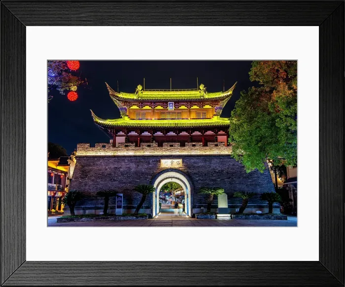 Framed Print : Baoning Gate, reconstructed 2004, at night, housing the drum tower in Guzicheng, ancient city of Jinhua City, Zhejiang Province, China Framed Print : Baoning Gate, reconstructed 2004, at night, housing the drum tower in Guzicheng, ancient city of Jinhua City, Zhejiang Province, China
