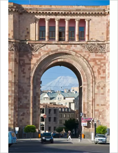 Armenian architecture with view through arch of Mount Ararat in the distance