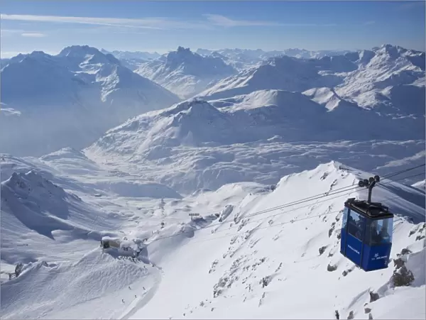 Vallugabahn cable car from summit of Valluga in St. Anton am Arlberg in winter snow