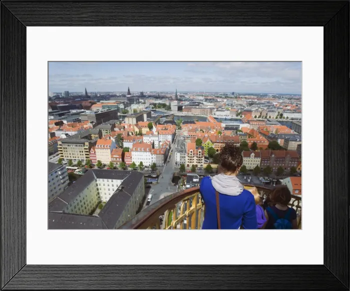 Framed Print : Tourists looking at view from the 17th century Vor Frelsers Church, Copenhagen Framed Print : Tourists looking at view from the 17th century Vor Frelsers Church, Copenhagen