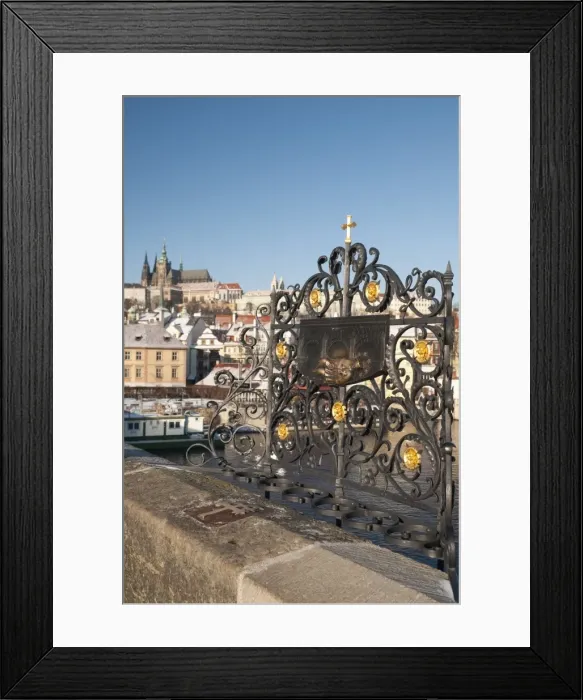 Framed Print : St. John of Nepomuk (Jan Nepomucky) shrine with cross at Charles Bridge with snow-covered Prague Castle and Mala Strana in background, UNESCO World Heritage Site, Prague, Czech Framed Print : St. John of Nepomuk (Jan Nepomucky) shrine with cross at Charles Bridge with snow-covered Prague Castle and Mala Strana in background, UNESCO World Heritage Site, Prague, Czech