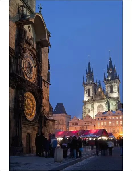 Astronomical Clock of Gothic Old Town Hall, stalls of Christmas Market