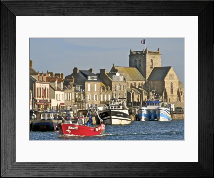 Framed Print : Harbour and fishing boats with houses and church in the background, Barfleur Framed Print : Harbour and fishing boats with houses and church in the background, Barfleur