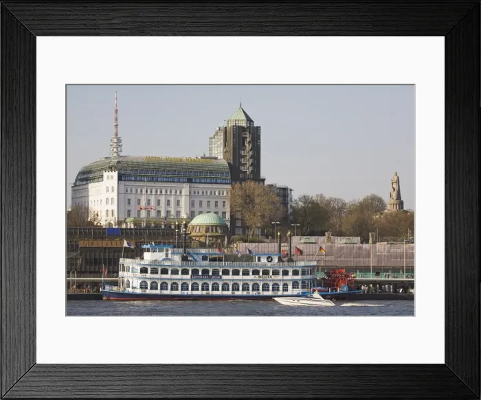 Framed Print : A paddle steamer docks in front of the St. Pauli Landing Stages (Landungsbruecken) Framed Print : A paddle steamer docks in front of the St. Pauli Landing Stages (Landungsbruecken)