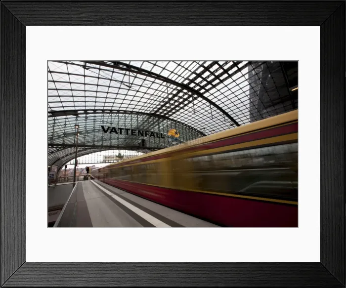 Framed Print : Train leaving Berlin Hauptbahnhof, the main railway station in Berlin, Germany, Europe Framed Print : Train leaving Berlin Hauptbahnhof, the main railway station in Berlin, Germany, Europe