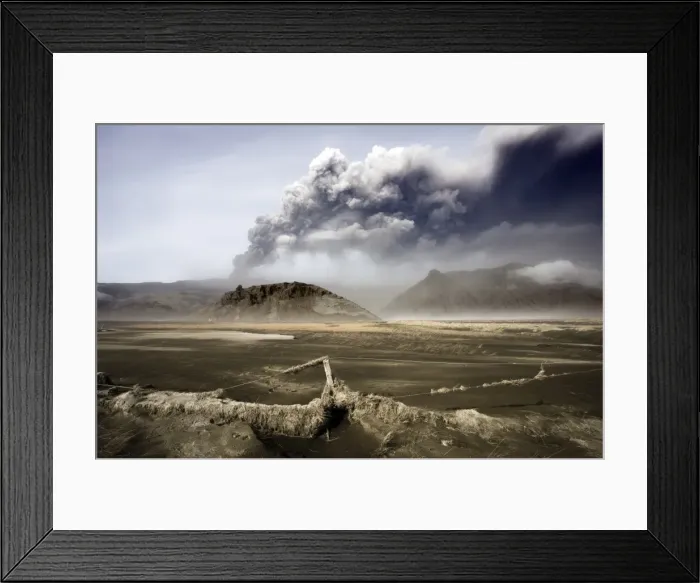 Framed Print : Landscape covered in volcanic ash and dust with the ash plume of the Eyjafjallajokull eruption in the distance, southern area, Iceland Framed Print : Landscape covered in volcanic ash and dust with the ash plume of the Eyjafjallajokull eruption in the distance, southern area, Iceland