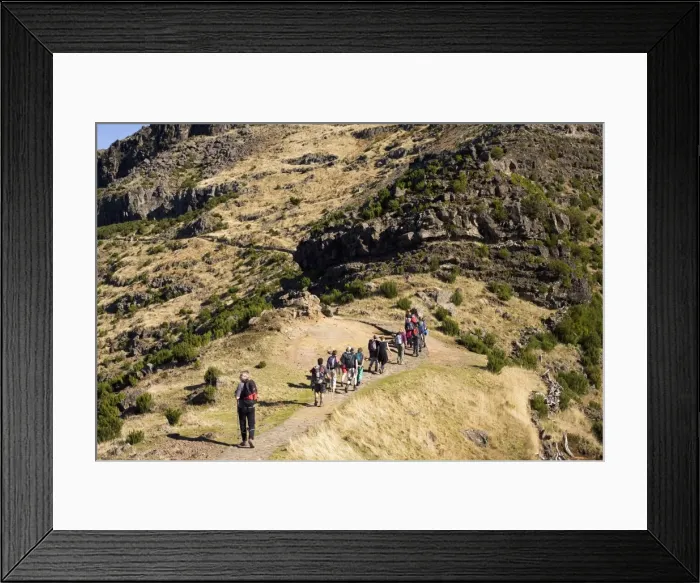 Framed Print : Walkers stride out on a marked footpath on the Pico Ruivo on the island of Madeira Framed Print : Walkers stride out on a marked footpath on the Pico Ruivo on the island of Madeira