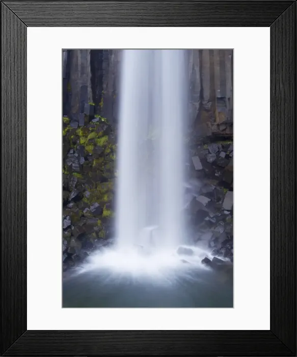 Framed Print : Water tumbling upon black basalt columns at famous Svartifoss waterfall in Skaftafell National Park Framed Print : Water tumbling upon black basalt columns at famous Svartifoss waterfall in Skaftafell National Park