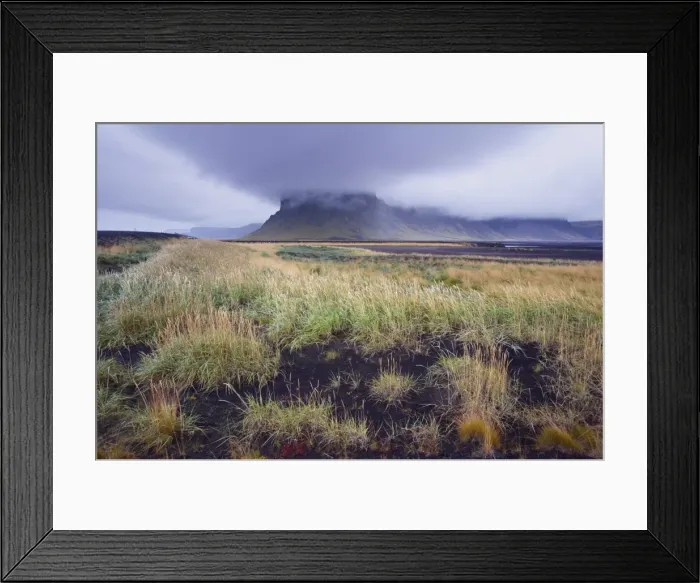 Framed Print : Mount Lomagnupur, 767 m, near Nupsstadur is a remarkable landmark above the flat black sand expanses of Skeidararsandur, south-east Iceland (Austurland), Iceland Framed Print : Mount Lomagnupur, 767 m, near Nupsstadur is a remarkable landmark above the flat black sand expanses of Skeidararsandur, south-east Iceland (Austurland), Iceland