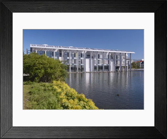 Framed Print : Radhus (City Hall), a contemporary concrete-and-glass building built in 1987 on the shores of Lake Tjornin, Reykjavik, Iceland Framed Print : Radhus (City Hall), a contemporary concrete-and-glass building built in 1987 on the shores of Lake Tjornin, Reykjavik, Iceland