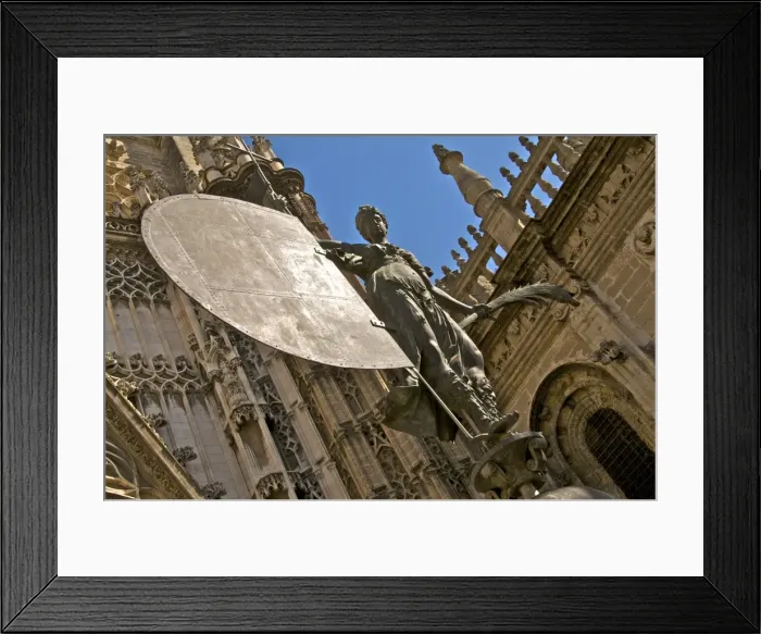 Framed Print : The Giralda, reproduction of the famous weather vane of the Victorious Faith statue with the Cathedral in the background, UNESCO World Heritage Site, Seville, Andalusia Framed Print : The Giralda, reproduction of the famous weather vane of the Victorious Faith statue with the Cathedral in the background, UNESCO World Heritage Site, Seville, Andalusia