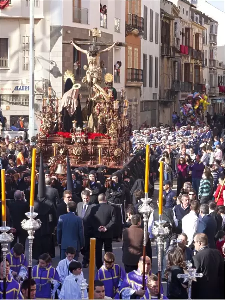 Religious float being carried through the streets during Semana Santa