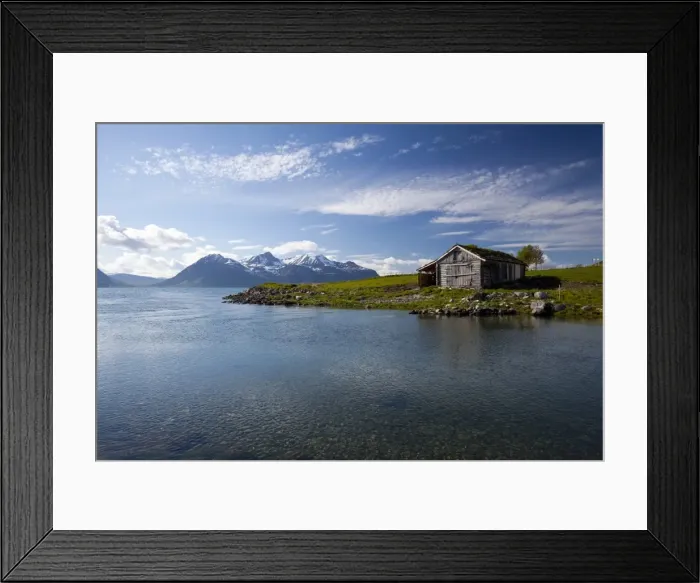 Framed Print : Cabin with traditional grass roof overlooking a fjord and snowy mountains in Lyngen Peninsula Framed Print : Cabin with traditional grass roof overlooking a fjord and snowy mountains in Lyngen Peninsula