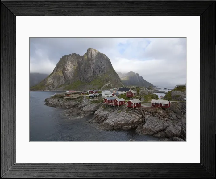 Framed Print : Reine village with typical red rorbuer and cod drying flakes, Moskenesoy island Framed Print : Reine village with typical red rorbuer and cod drying flakes, Moskenesoy island