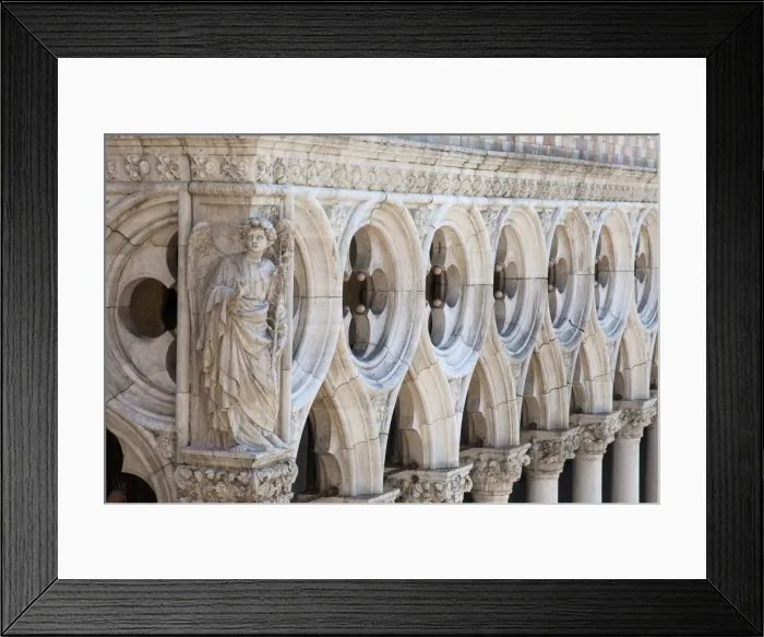 Framed Print : Exterior detail of carving of an angel on the 15th century Palazzo Ducale (Doges Palace) Framed Print : Exterior detail of carving of an angel on the 15th century Palazzo Ducale (Doges Palace)