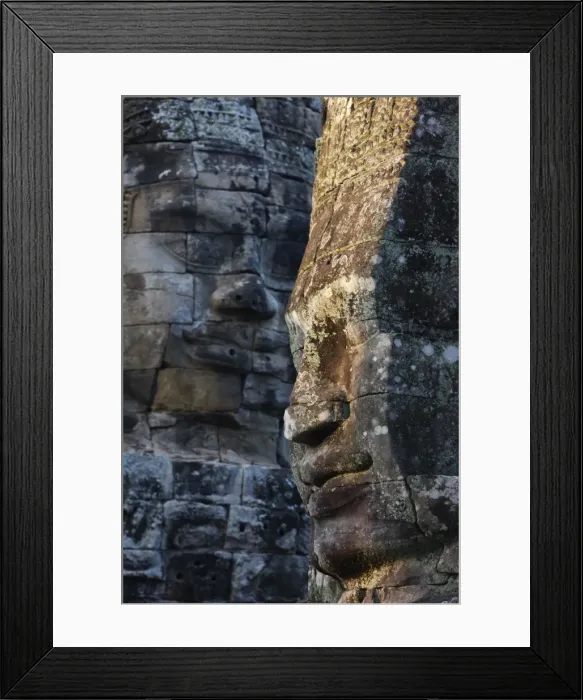 Framed Print : Stone faces, which may depict Jayavarman VII as a Bodhisattva, on towers in the Bayon Temple Framed Print : Stone faces, which may depict Jayavarman VII as a Bodhisattva, on towers in the Bayon Temple