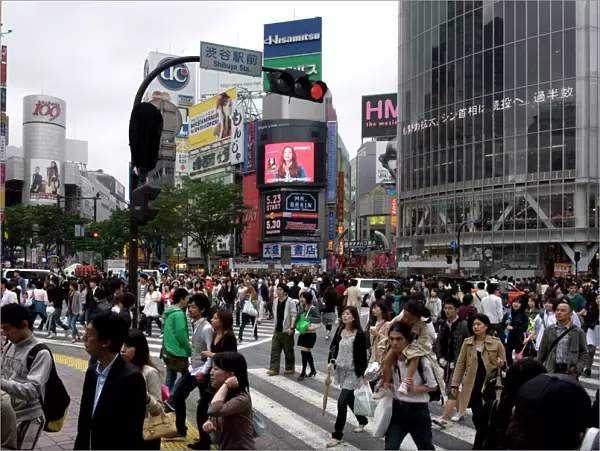 Shibuya crossing in front of the Shibuya train station is one of Tokyos busiest city centers