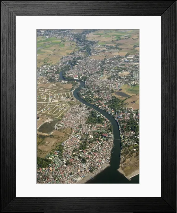 Framed Print : Aerial view of dormitory township on river into south end of Manila Bay Framed Print : Aerial view of dormitory township on river into south end of Manila Bay