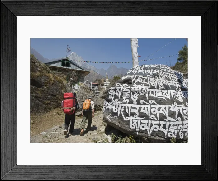 Framed Print : Trekkers walking past a mani stone, Solu Khumbu Everest Region, Sagarmatha National Park Framed Print : Trekkers walking past a mani stone, Solu Khumbu Everest Region, Sagarmatha National Park