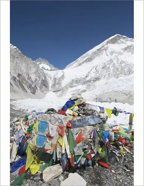 Prayer flags at the Everest Base Camp sign, Solu Khumbu Everest Region