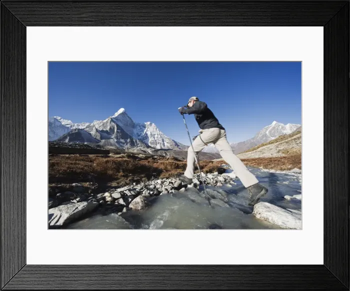 Framed Print : Trekker crossing a mountain stream, Ama Dablam, 6812m, behind, Solu Khumbu Everest Region Framed Print : Trekker crossing a mountain stream, Ama Dablam, 6812m, behind, Solu Khumbu Everest Region